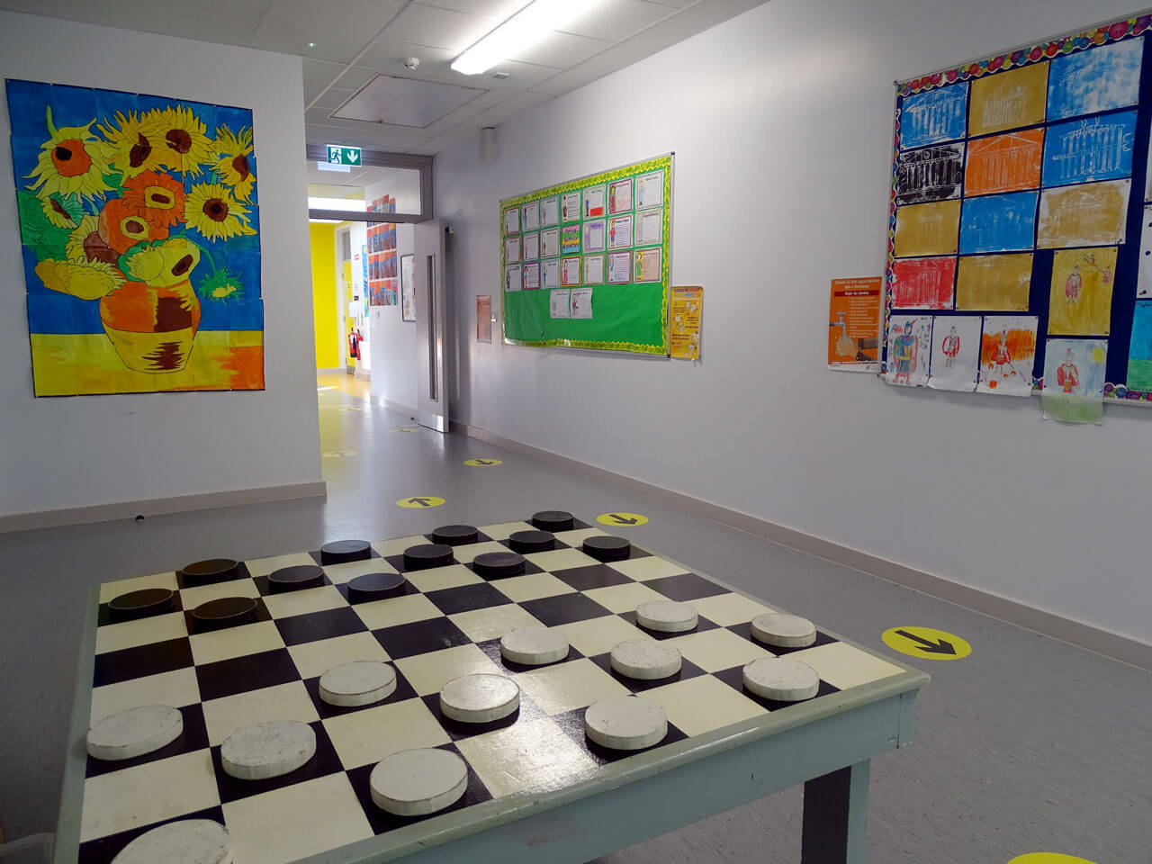 Photo of chess table in Photo of hurleys in Gaelscoil Mhichíl Uí Choileáin